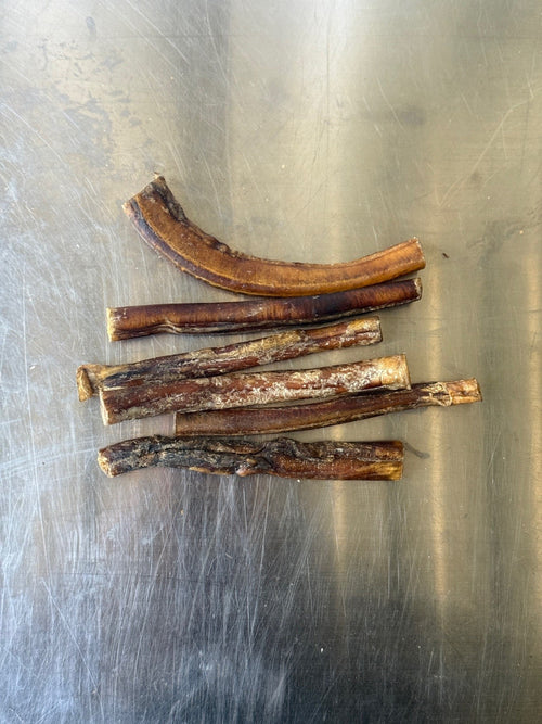 BEEF BULLY STICKS — the treats, shown loose (1 of 2)